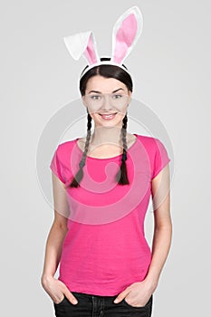 Beautiful young woman as easter bunny