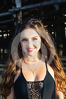 Beautiful young woman at the beach