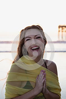 Beautiful young woman at the beach