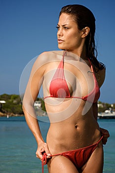 Beautiful young woman on a beach.