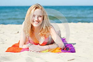 Beautiful young woman on a beach