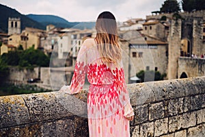 Beautiful young woman in Besalu, Spain