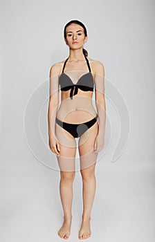 Beautiful young woman in bikini