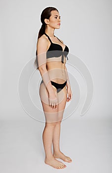 Beautiful young woman in bikini