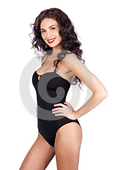 Beautiful young woman in black bikini