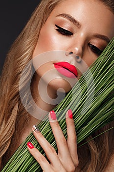 Beautiful young woman with bright makeup and neon pink nails. Beauty face.