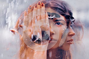 Beautiful young woman with butterfly. conceptual. double exposure
