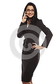 Beautiful young woman calling by mobile