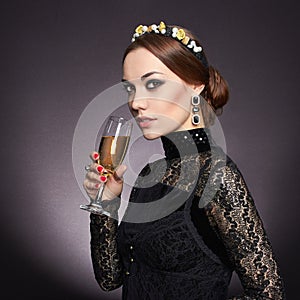 Beautiful young woman with champagne