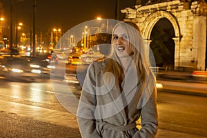 Beautiful Young Woman In A City At Night