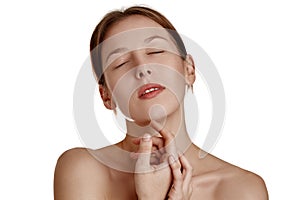 Beautiful young woman with clean fresh skin. Face treatment. Cosmetology, beauty and spa. Natural clear skin, close-up face