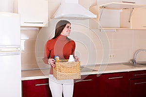 Woman cleaning her kitchen