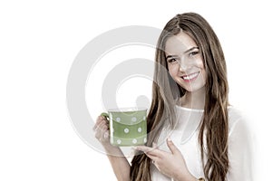 Beautiful young woman with cup of coffee