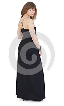 Beautiful young woman in dark long dress