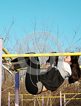 Beautiful young woman doing sports outdoors. Fitness concept.