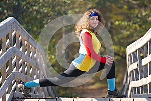 Beautiful young woman doing stretching exercise