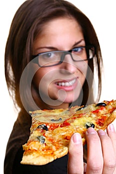 Beautiful young woman eating pizza