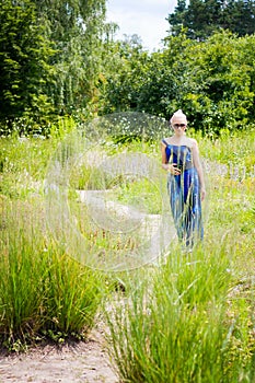 Beautiful Young Woman Enjoying Nature