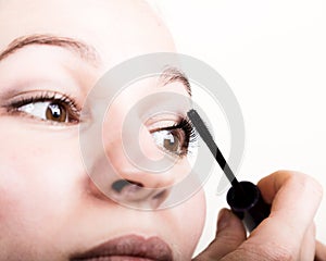 Beautiful young woman eyelash extension. Woman eye with long eyelashes. Beauty salon concept