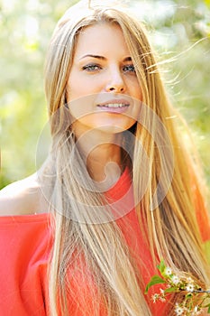 Beautiful young woman face closeup