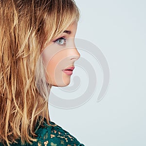 Beautiful young woman face, closeup portrait