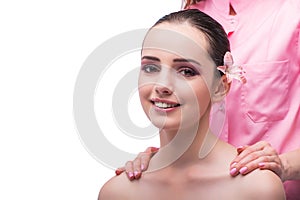 The beautiful young woman during face massage session