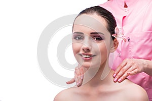 The beautiful young woman during face massage session