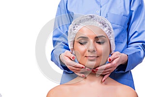 The beautiful young woman during face massage session