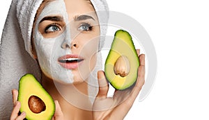 Beautiful young woman with facial mask and fresh avocado on white background. Beauty skin care