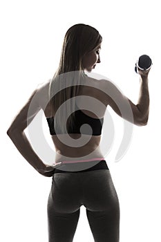 Beautiful young woman fitness dumbbells portrait