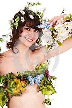 Beautiful young woman with flower and butterfly.