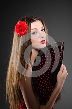 Beautiful young woman with flower