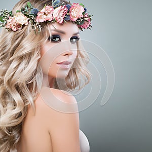 Beautiful Young Woman with Flowers Hairstyle
