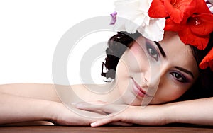 Beautiful young woman with flowers in their hair