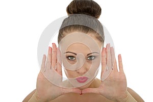 Beautiful Young Woman Framing Her Face With Her Hands Looking Ha