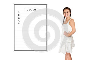 Beautiful young woman in front of a whiteboard