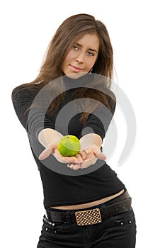 Beautiful young woman gives green apple.