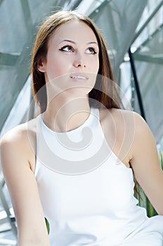 Beautiful young woman giving smile