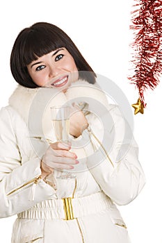 Beautiful young woman with a glass of champagne