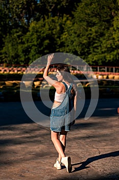 Beautiful young woman on the go-kart track