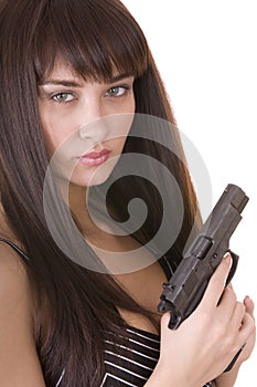 Beautiful young woman with gun.