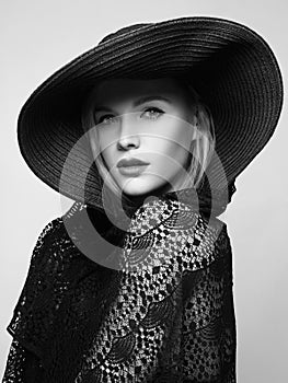 Beautiful young woman in hat