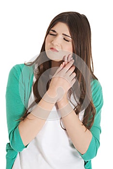 Beautiful young woman having toothache.