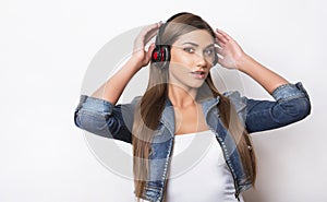 Beautiful young woman with head phones