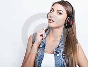 Beautiful young woman with head phones