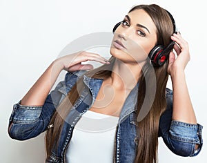 Beautiful young woman with head phones