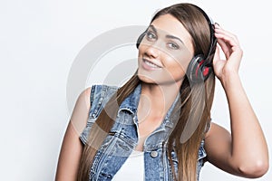 Beautiful young woman with head phones