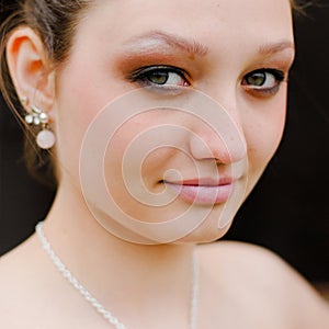 Beautiful young woman head shot closeup