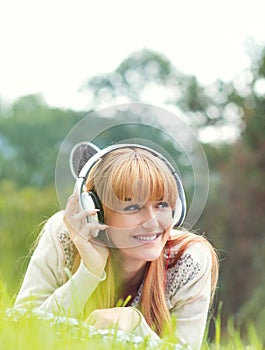 Beautiful young woman with headphones