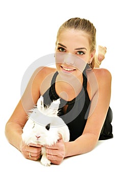 Beautiful young woman with her bunny